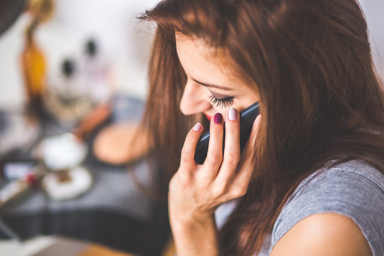 Closeup Portrait Of Young Lady Talking On Mobile Phone 6386 1536x1024