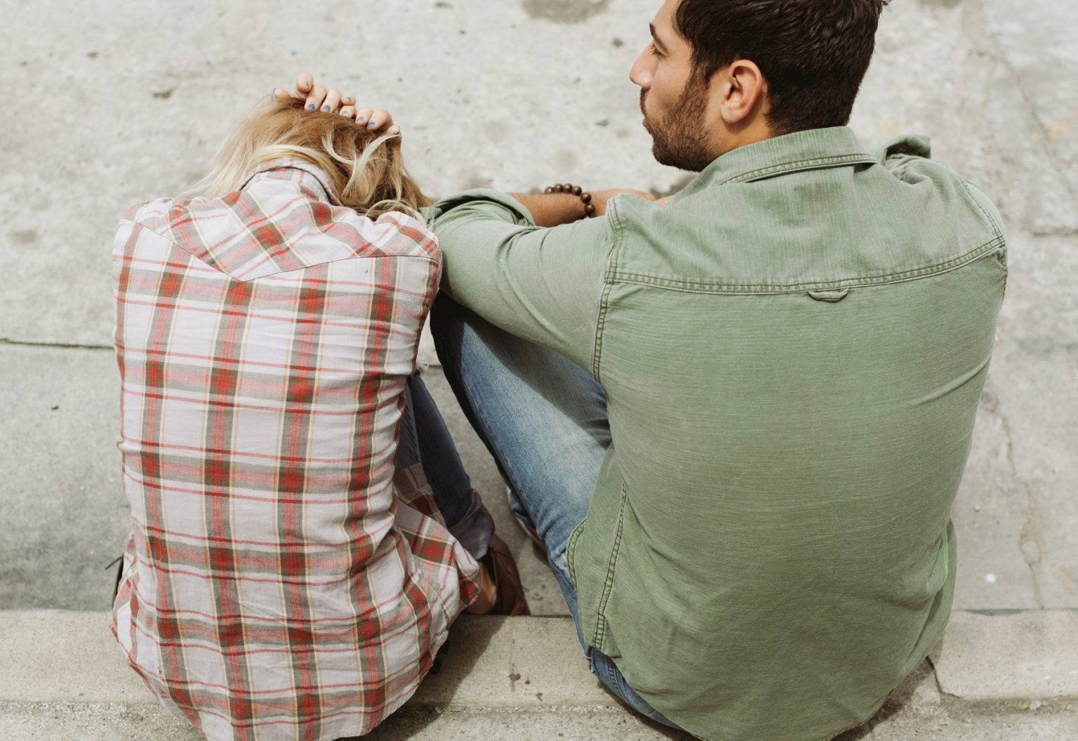 Man And Woman Sitting On Sidewalk 226166 1536x1055