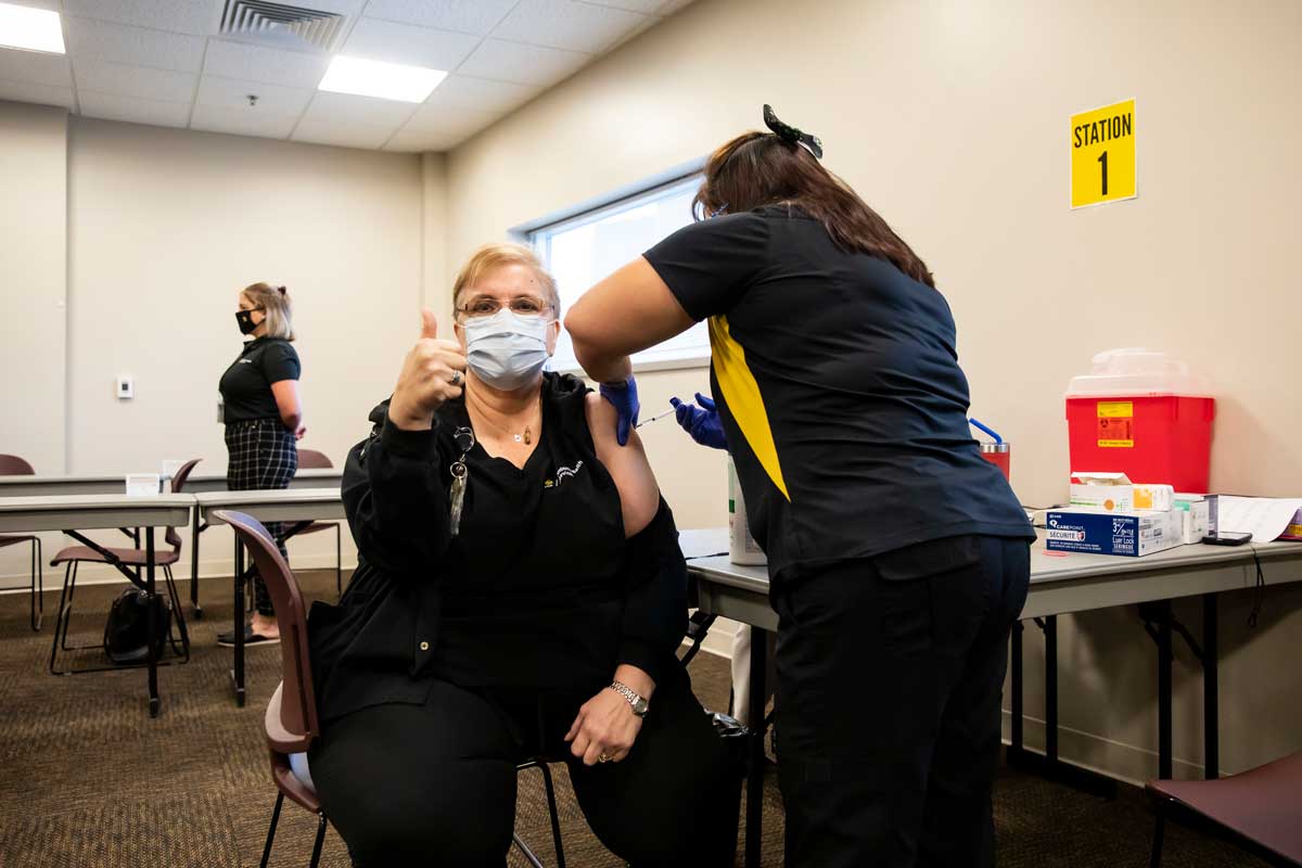 ucf covid vaccine thumbs up