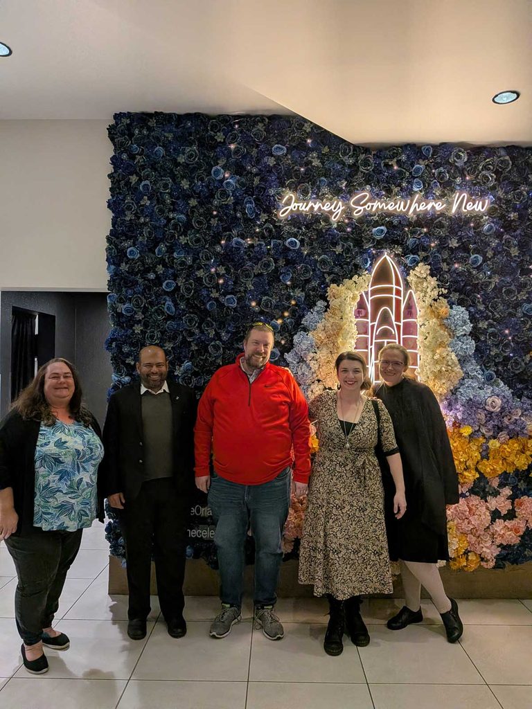 Zaheer Ali, second from left, with four instructional designers who support UCF’s Space PMBA program.